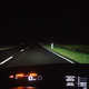 Driving in the dark on empty Bavarian roads.